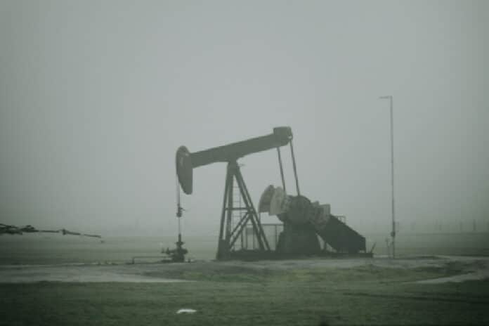 An oil pump in the middle of a field
